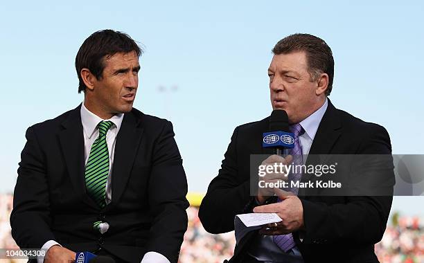 Channel Nine commentators Andrew Johns and Phil Gould speak during their pre-match show on the sideline before the NRL Fourth Qualifying Final match...