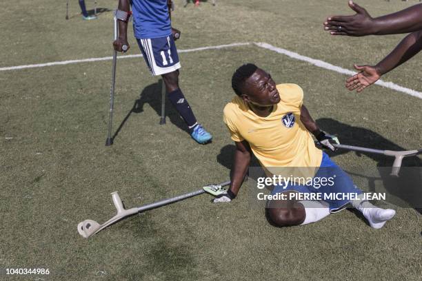 Training session of the Haitian football selection of players with amputated limbs is seen on September 14, 2018 in Croix-des Bouquets, Haiti before...