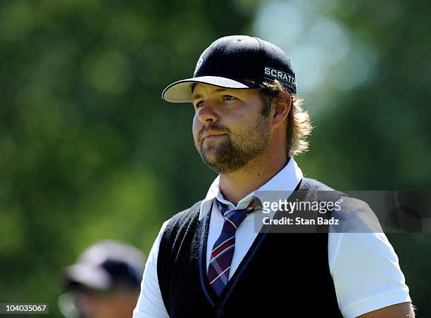 Ryan Moore watches play from the second tee box during the final round of the BMW Championship at Cog Hill Golf & Country Club on September 12, 2010...