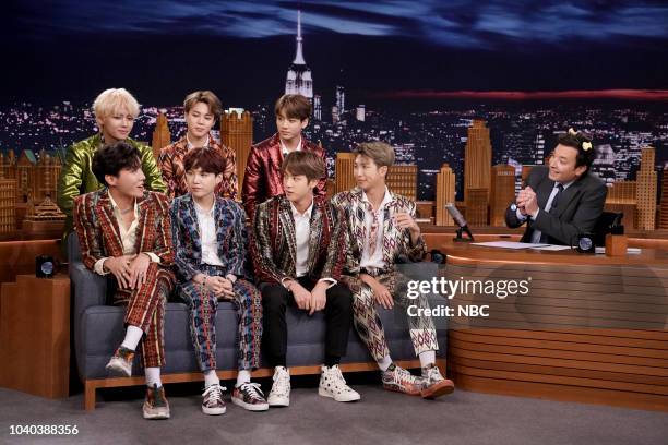 Episode 0931 -- Pictured: Band BTS during an interview with host Jimmy Fallon on September 25, 2018 --