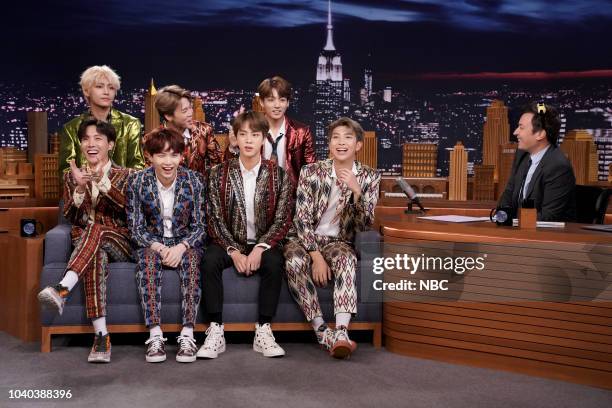 Episode 0931 -- Pictured: Band BTS during an interview with host Jimmy Fallon on September 25, 2018 --