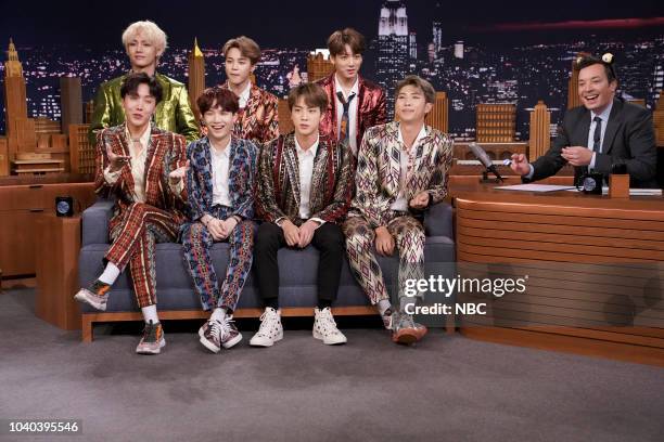 Episode 0931 -- Pictured: Band BTS during an interview with host Jimmy Fallon on September 25, 2018 --