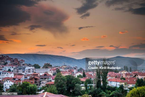 sunset over the hills in town of veles, macedonia - north macedonia stock pictures, royalty-free photos & images
