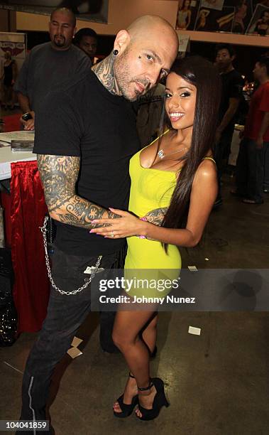 Musician and adult film star Evan Seinfeld and adult film star Lupe Fuentes attend the Adultcon Adult Entertainment Convention at Los Angeles...