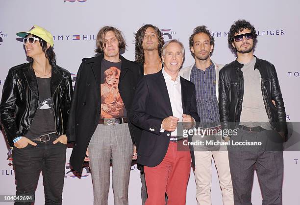 Musicians Julian Casablancas, Nikolai Fraiture, Nick Valensi, designer Tommy Hilfiger, and musicians Albert Hammond Jr. And Fabrizio Moretti of the...