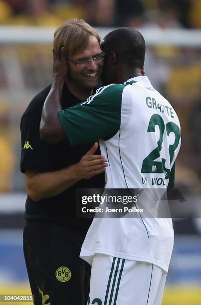 Grafite of Wolfsburg hugs head coach Juergen Klopp of Dortmuns after the Bundesliga match between Borussia Dortmund and VfL Wolfsburg at Signal Iduna...