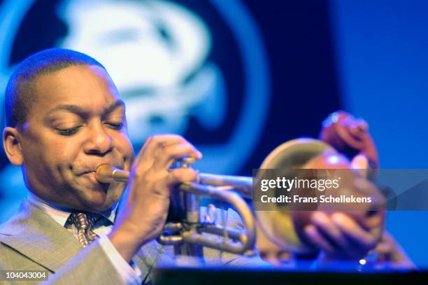 Wynton Marsalis performs on stage, playing a muted trumpet, at The North Sea Jazz Festival on July 12 2003 in The Hague, Netherlands.