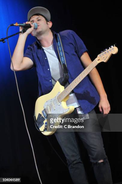 Jake Duzsik of Health performs on the Dance Stage during the third and final day of the Reading Festival on August 29, 2010 in Reading, England.