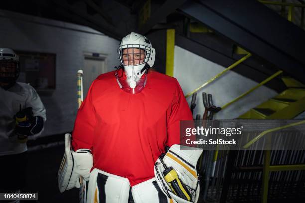 portrait of a female ice hockey player - england hockey women stock pictures, royalty-free photos & images