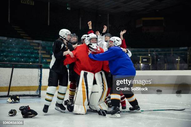 ice hockey players celebrating - ice hockey celebration stock pictures, royalty-free photos & images