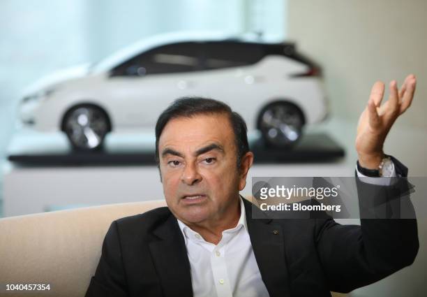 Carlos Ghosn, chairman of the alliance between Renault SA, Nissan Motor Co. And Mitsubishi Motors Corp., speaks during an interview at Nissan's...