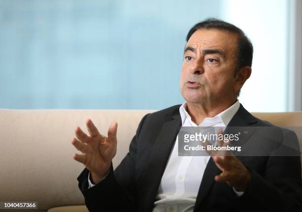 Carlos Ghosn, chairman of the alliance between Renault SA, Nissan Motor Co. And Mitsubishi Motors Corp., speaks during an interview at Nissan's...