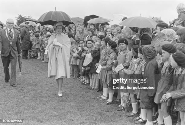 Queen Elizabeth II on a walkabout in Auckland during a Royal Tour of New Zealand, February-March 1977.