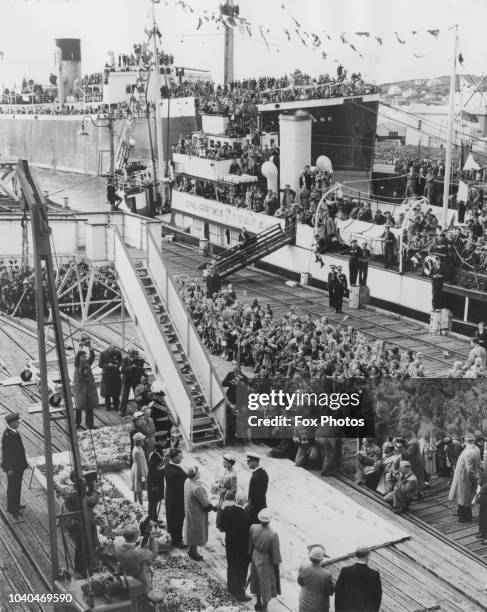 Queen Elizabeth II and Prince Philip say their farewells at Bluff Harbour, New Zealand, before embarking on the SS Gothic, for Australia, during the...