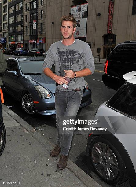 Liam Hemsworth visits Miley Cyrus at Gemini 14 salon on June 16, 2010 in New York City.