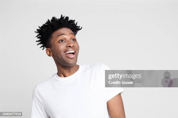 afro american man with surprised expression - fashion model on white stock pictures, royalty-free photos & images