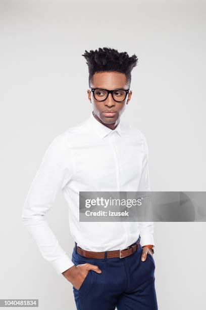 handsome young afro american man looking away - black shirt stock pictures, royalty-free photos & images