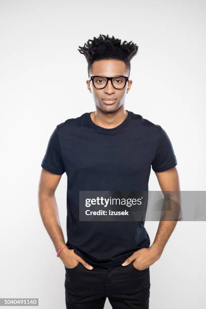 handsome guy with funky hairstyle and nerd glasses - fashion model on white stock pictures, royalty-free photos & images