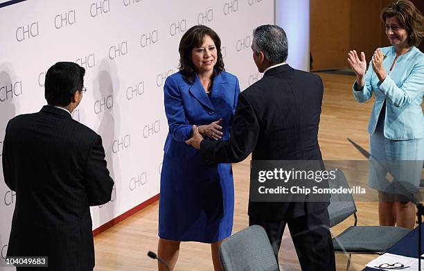 Labor Secretary Hilda Solis , is welcomed by Rep. Xavier Becerra , U.S. Hispanic Chamber of Commerce President and CEO Javier Palomarez and Promérica...