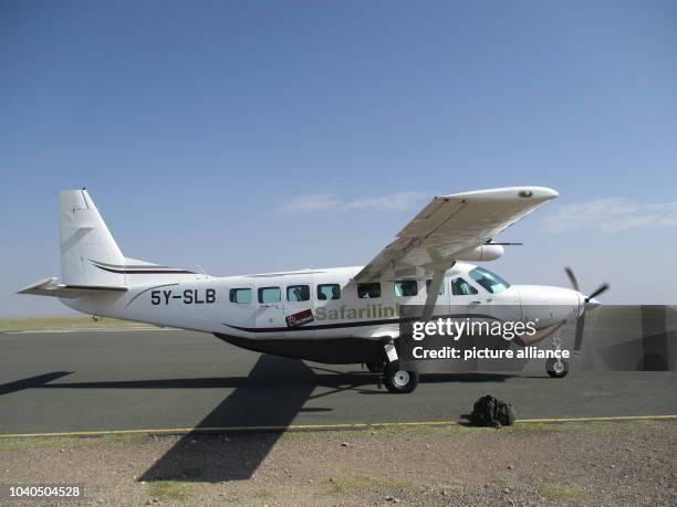 View of a Cessna 208B Grand Caravan of the local airline Safarilink on a small airfield at the Masai Mara national park in Kenya, 27 February 2017....