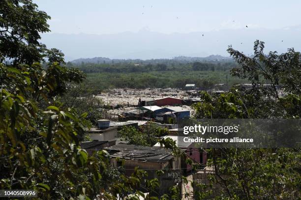 View of a settlement in the dumps of Gramacho in Rio den Janeiro, Brazil, 13 Augsut 2016. Hundreds of people live in wooden barracks without water,...