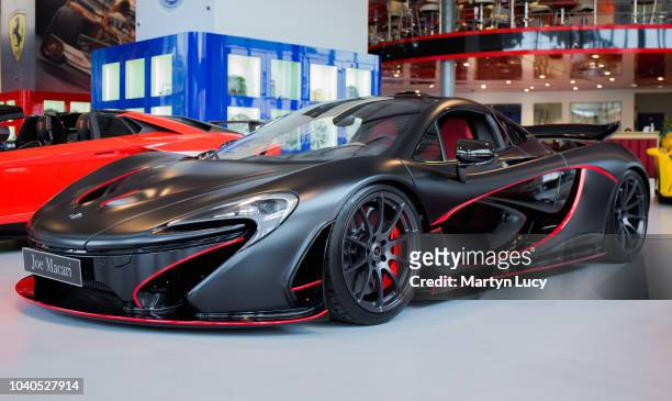 The McLaren P1 seen for sale at Joe Macari Performance Cars in Wandsworth, London. This car has a large amount of added extras to the car by McLaren...