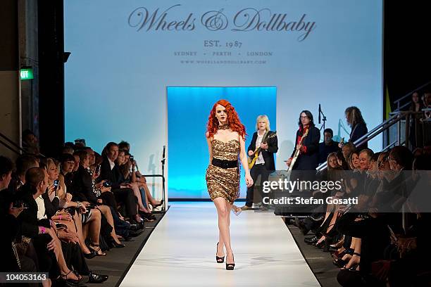 Model Tiah Eckhardt showcases designs by Wheels & Dollbaby during the Wheels & Dollbaby collection catwalk show as part of Perth Fashion Week 2010 at...