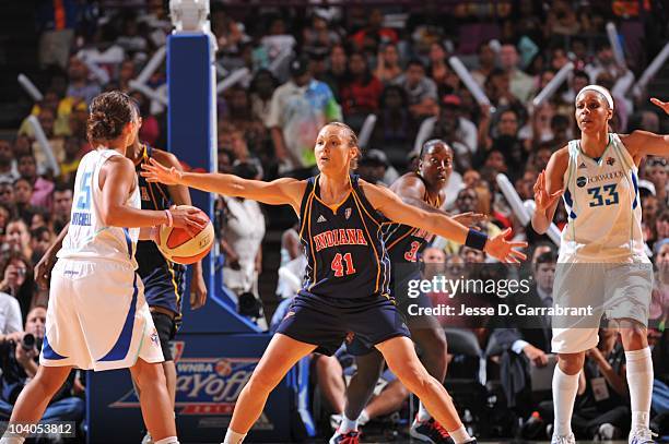 Tully Bevilaqua of the Indiana Fever defends against Leilani Mitchell of the New York Liberty during Game Three of the 2010 WNBA Eastern Conference...