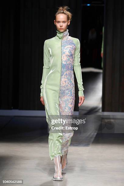 Model walks the runway at the Ricostru show during Milan Fashion Week Spring/Summer 2019 on September 19, 2018 in Milan, Italy.