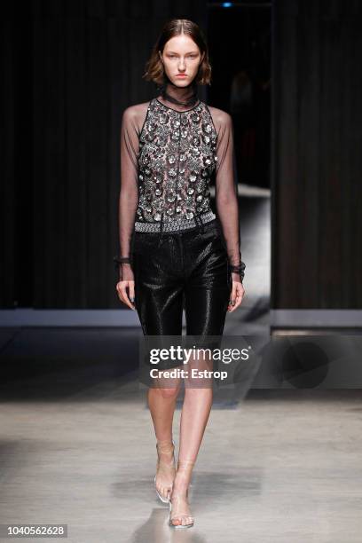 Model walks the runway at the Ricostru show during Milan Fashion Week Spring/Summer 2019 on September 19, 2018 in Milan, Italy.