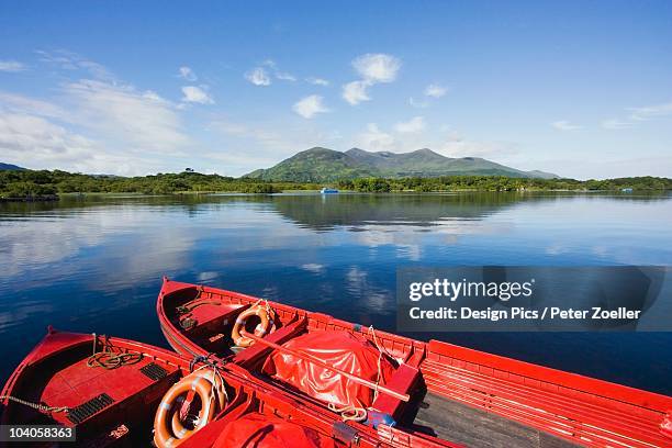 two boats in the water - killarney lake stock pictures, royalty-free photos & images