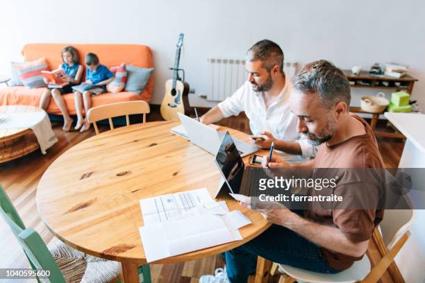 LGBTQ Couple working from home