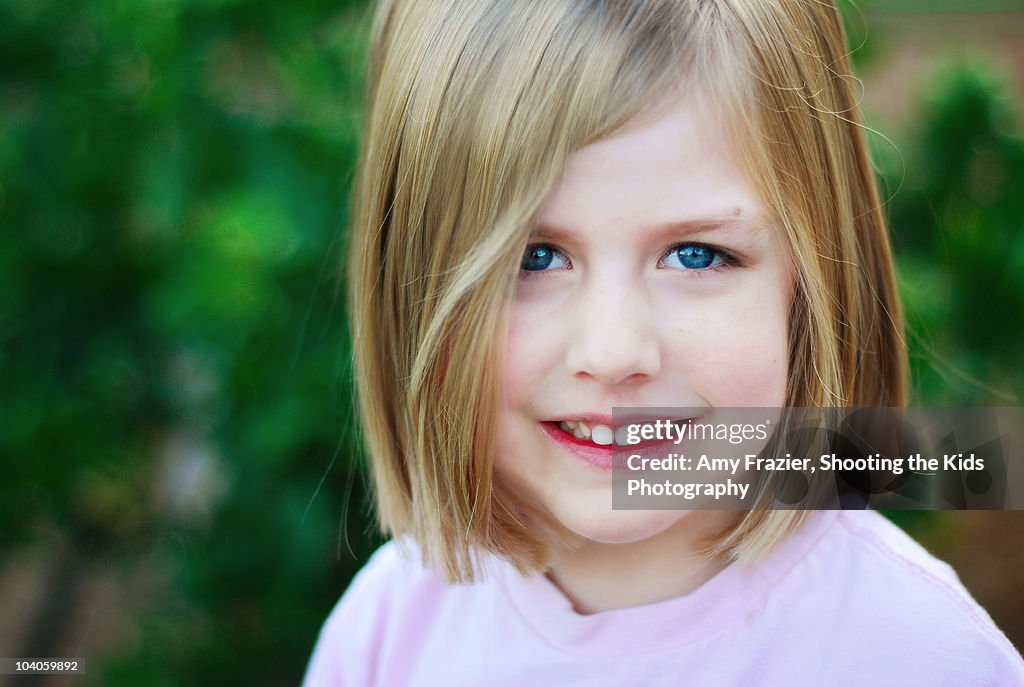 Young girl smiles