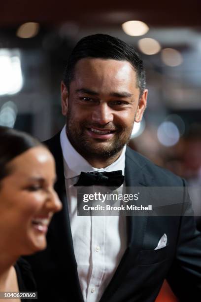 John Sutton,with wife Stacey, wears M.J. Bale for the 2018 Dally M Awards at Overseas Passenger Terminal on September 26, 2018 in Sydney, Australia.