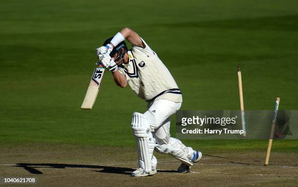 Joe Denly of Kent is bowled by Keith Barker of Warwickshire for 0 during Day Three of the Specsavers County Championship Division Two match between...