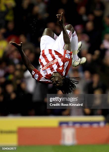 Kenwyne Jones of Stoke City celebrates scoring his team's first goal during the Barclays Premier League match between Stoke City and Aston Villa at...