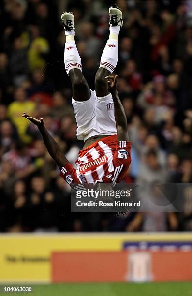 Kenwyne Jones of Stoke City celebrates scoring his team's first goal during the Barclays Premier League match between Stoke City and Aston Villa at...