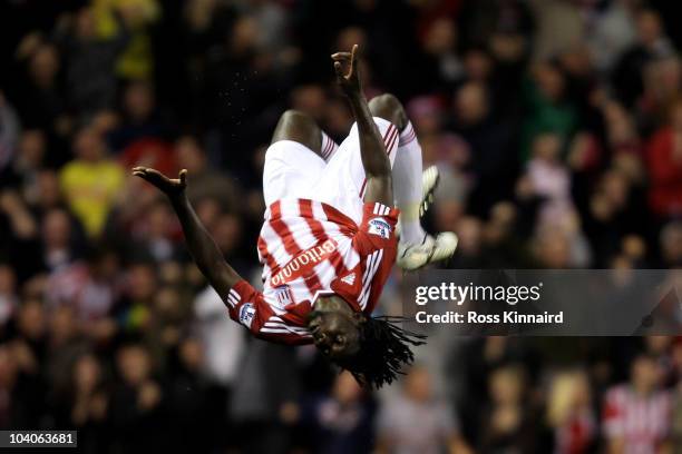 Kenwyne Jones of Stoke City celebrates scoring his team's first goal during the Barclays Premier League match between Stoke City and Aston Villa at...