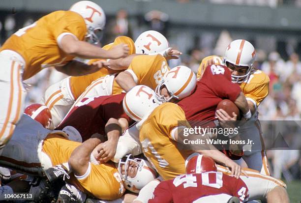 Tennessee Jim Hahn and David Murphy in action, defense vs Alabama Ed Morgan . Birmingham, AL CREDIT: Walter Iooss Jr.