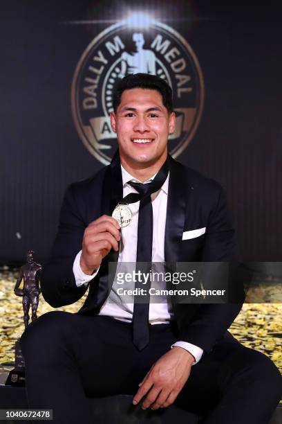 Roger Tuivasa-Sheck of the New Zealand Warriors poses on stage with the Dally M Award during the 2018 Dally M Awards at Overseas Passenger Terminal...