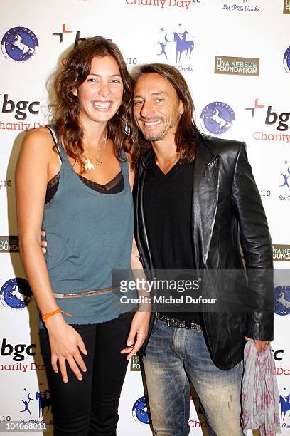 Tamara Kaboutchek and Bob Sinclar attend the Aurel BCG Charity Day Benefit 'Les Petits Cracks' on September 13, 2010 in Paris, France.