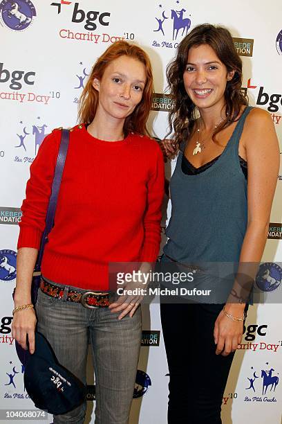 Audrey Marney and Tamara Kaboutchek attend the Aurel BCG Charity Day Benefit 'Les Petits Cracks' on September 13, 2010 in Paris, France.