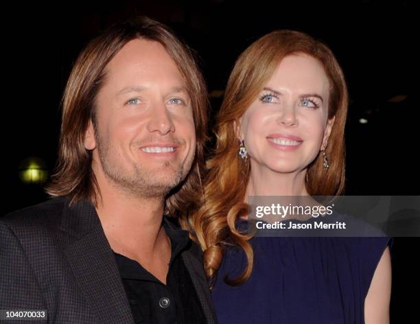 Musician Keith Urban and actress Nicole Kidman arrive at the "Rabbit Hole" Premiere held at The Elgin during the 35th Toronto International Film...