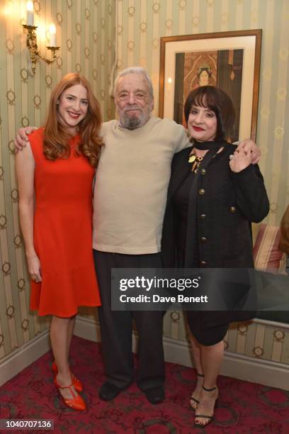 Stephen Sondheim poses backstage with cast members Rosalie Craig and Patti LuPone of the new West End production of "Company" at Gielgud Theatre on...