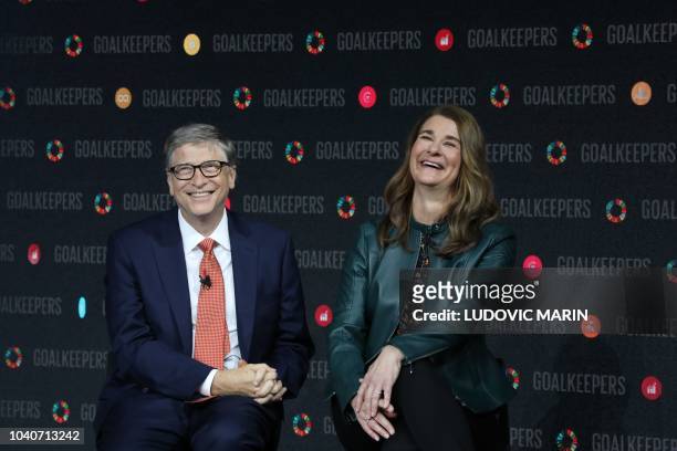 Bill Gates and his wife Melinda Gates speak during the Goalkeepers event at the Lincoln Center on September 26 in New York.