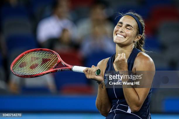 Monica Puig of Puerto Rico celebrates winning her match against Caroline Wozniacki of Denmark during 2018 Wuhan Open at Optics Valley International...