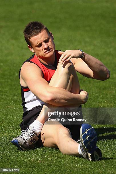 Michael Gardiner of the Saints stretches during a St Kilda Saints AFL training session at Linen House Oval on September 14, 2010 in Melbourne,...