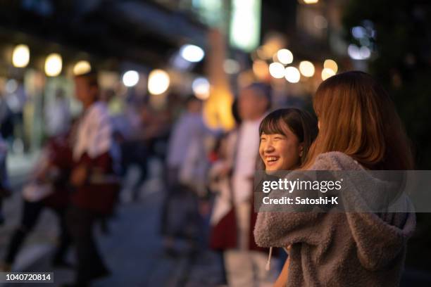 young female friends having fun with japanese autumn festival - light to night festival 2018 stock pictures, royalty-free photos & images