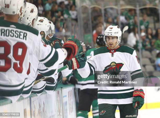 Matt Read of the Minnesota Wild celebrates a goal against the Dallas Stars during a preseason game at American Airlines Center on September 24, 2018...