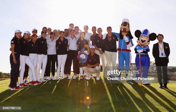 Members of The Juniors Ryder Cup teams celebrate following the Junior Ryder Cup GolfSixes ahead of the 2018 Ryder Cup at Le Golf National on...